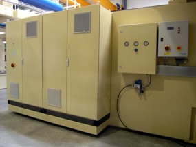 Integrated winding shaft extractor: arrangement of switch cabinet
